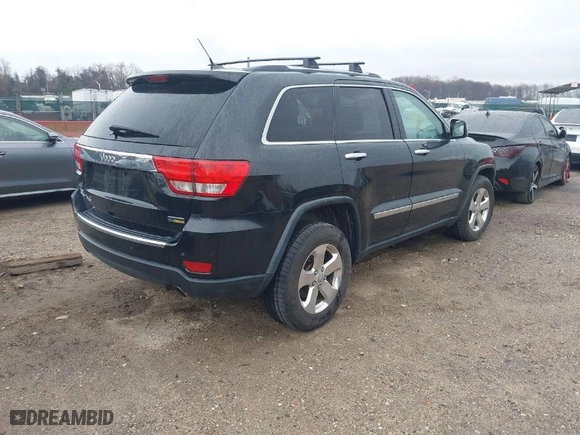 2013 Jeep Grand Cherokee Limited with VIN 1C4RJFBG0DC656382, listed as a IAAI auction lot 41870162 with 162,869 mi miles. Bid and sale history available at carsss.com. Image 4.