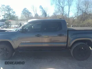 2018 Toyota Tacoma SR5 with VIN 5TFAZ5CN0JX056706, listed as a IAAI auction lot 41774141 with 31,738 mi miles and . Bid and sale history available at DreamBid. Image 14.