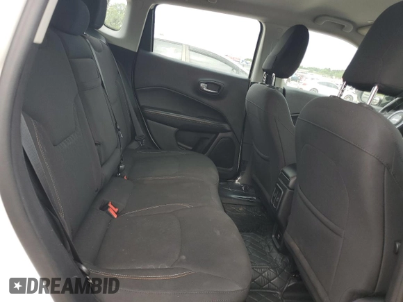 2018 Jeep Compass Sport z VIN 3C4NJCAB3JT123431, wystawiony jako Copart lot #63045144 z przebiegiem 118 849 mil mil oraz Szkoda całkowita • Salvage title. Historia ofert i sprzedaży dostępna na DreamBid. Obrazek 11.
