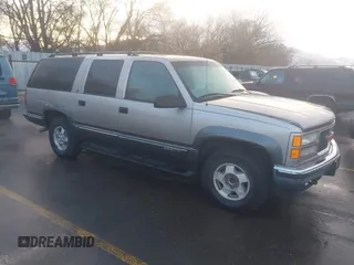 1999 GMC Suburban with VIN 1GKFK16R4XJ799354, listed as a IAAI auction lot 41696999 with 269,606 mi miles. Bid and sale history available at carsss.com. Image 1.