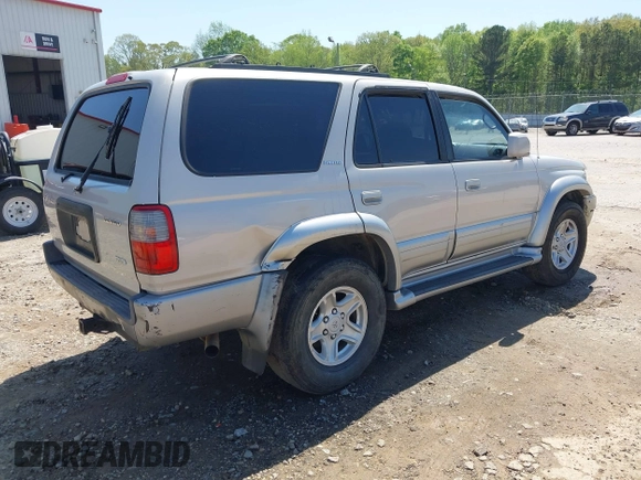 2000 Toyota 4Runner Limited with VIN JT3GN87R1Y0164022, listed as a IAAI auction lot 41990999 with 337,094 mi miles and . Bid and sale history available at DreamBid. Image 4.