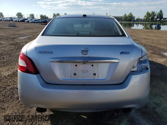 2010 Nissan Maxima SV with VIN 1N4AA5AP7AC871283, listed as a Copart auction lot 66394785 with 295,925 mi miles and Salvage title. Bid and sale history available at DreamBid. Image 6.