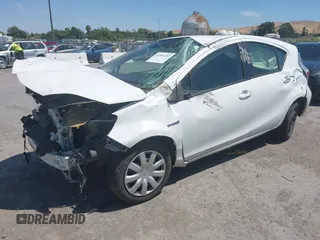 2013 Toyota Prius One z VIN JTDKDTB39D1533017, wystawiony jako IAAI lot #42383282 z przebiegiem 162 435 mil mil oraz . Historia ofert i sprzedaży dostępna na DreamBid. Obrazek 2.