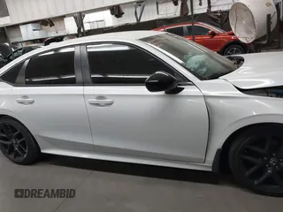 2023 Honda Civic Sport with VIN 2HGFE2F52PH531718, listed as a IAAI auction lot 42483695 with 21,781 mi miles and . Bid and sale history available at DreamBid. Image 13.