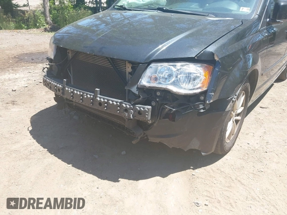 2014 Dodge Grand Caravan SXT with VIN 2C4RDGCG2ER313531, listed as a IAAI auction lot 42221726 with 177,065 mi miles and . Bid and sale history available at DreamBid. Image 6.