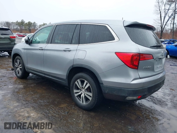 2017 Honda Pilot EX-L with VIN 5FNYF6H51HB069068, listed as a IAAI auction lot 41567728 with 100,618 mi miles and . Bid and sale history available at DreamBid. Image 14.