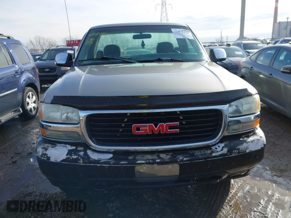 1999 GMC New Sierra 1500 SLE with VIN 1GTEK14T4XE539051, listed as a IAAI auction lot 41472124 with 151,088 mi miles. Bid and sale history available at carsss.com. Image 12.