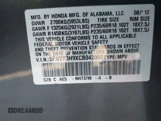 2012 Honda Pilot Touring with VIN 5FNYF3H9XCB042090, listed as a IAAI auction lot 41751359 with 140,424 mi miles and . Bid and sale history available at carsss.com. Image 9.