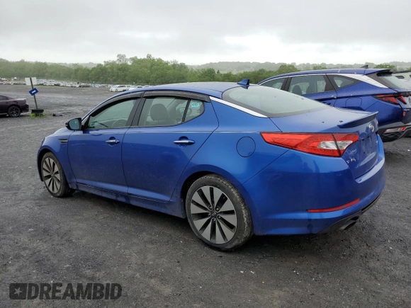 2011 Kia Optima SX z VIN KNAGR4A6XB5109812, wystawiony jako Copart lot #57073075 z przebiegiem 157 953 mil mil oraz Czysty tytuł • Clean title. Historia ofert i sprzedaży dostępna na DreamBid. Obrazek 2.