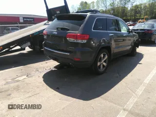 2014 Jeep Grand Cherokee Limited with VIN 1C4RJEBG7EC482872, listed as a IAAI auction lot 41991274 with 125,343 mi miles and . Bid and sale history available at DreamBid. Image 4.