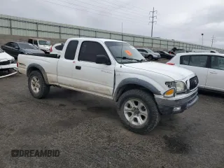 2002 Toyota Tacoma z VIN 5TEWN72N42Z895430, wystawiony jako Copart lot #57458155 z przebiegiem Nie podano mil oraz Szkoda całkowita • Salvage title. Historia ofert i sprzedaży dostępna na DreamBid. Obrazek 4.