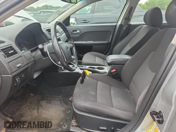 2012 Ford Fusion Hybrid z VIN 3FADP0L34CR227740, wystawiony jako Copart lot #64989475 z przebiegiem 134 862 mil mil oraz Szkoda całkowita • Salvage title. Historia ofert i sprzedaży dostępna na DreamBid. Obrazek 7.