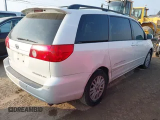 2009 Toyota Sienna XLE with VIN 5TDZK22C19S227678, listed as a IAAI auction lot 42074502 with 173,718 mi miles. Bid and sale history available at carsss.com. Image 4.