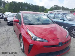 2021 Toyota Prius L Eco with VIN JTDKAMFU7M3147346, listed as a IAAI auction lot 41979206 with 55,267 mi miles. Bid and sale history available at carsss.com. Image 1.
