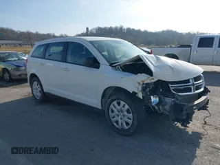 2015 Dodge Journey SE z VIN 3C4PDCAB0FT720110, wystawiony jako IAAI lot #38241424 z przebiegiem 160 778 mil mil oraz . Historia ofert i sprzedaży dostępna na DreamBid. Obrazek 1.