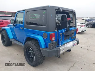 2014 Jeep Wrangler Arctic z VIN 1C4GJWBG3EL313350, wystawiony jako IAAI lot #41442520 z przebiegiem Nie podano mil oraz . Historia ofert i sprzedaży dostępna na DreamBid. Obrazek 3.