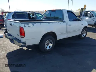 1997 Ford F-150 with VIN 1FTDF1727VKA49639, listed as a IAAI auction lot 42121938 with 317,520 mi miles and . Bid and sale history available at DreamBid. Image 4.