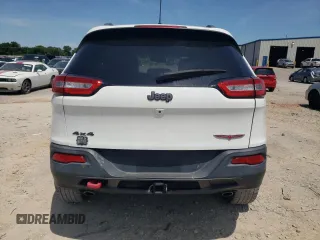 2016 Jeep Cherokee Trailhawk with VIN 1C4PJMBS3GW102000, listed as a Copart auction lot 60866505 with 120,985 mi miles and Salvage title. Bid and sale history available at DreamBid. Image 6.