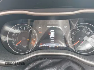 2015 Jeep Cherokee Trailhawk with VIN 1C4PJMBS1FW640483, listed as a IAAI auction lot 41883688 with 103,589 mi miles. Bid and sale history available at carsss.com. Image 15.