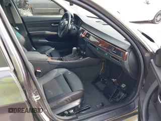 2007 BMW 3 Series 335i with VIN WBAVB73517KY60596, listed as a IAAI auction lot 42504350 with 111,403 mi miles and . Bid and sale history available at DreamBid. Image 5.
