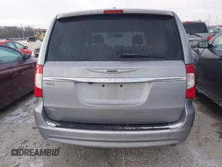 2014 Chrysler Town & Country Touring z VIN 2C4RC1BG2ER131605, wystawiony jako IAAI lot #41406423 z przebiegiem 167 567 mil mil oraz . Historia ofert i sprzedaży dostępna na DreamBid. Obrazek 16.
