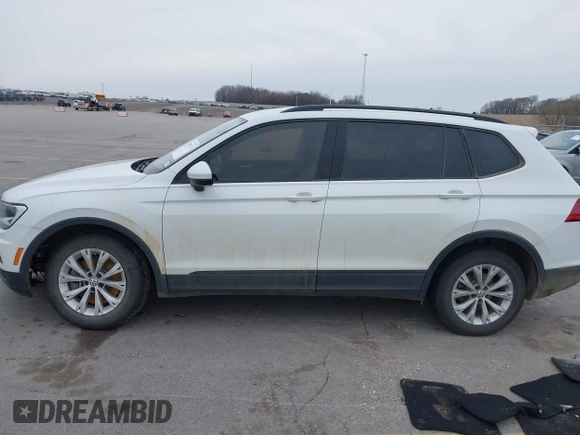 2020 Volkswagen Tiguan S with VIN 3VV1B7AX5LM079123, listed as a IAAI auction lot 41957273 with 89,449 mi miles and . Bid and sale history available at DreamBid. Image 14.