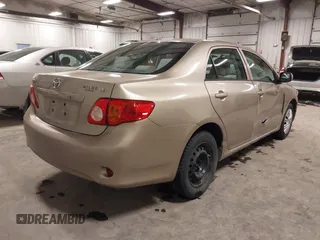 2010 Toyota Corolla with VIN 2T1BU4EE2AC369927, listed as a IAAI auction lot 41519760 with 135,639 mi miles. Bid and sale history available at carsss.com. Image 4.