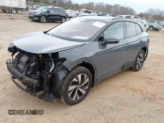 2023 Volkswagen ID.4 Pro z VIN 1V2DNPE85PC048594, wystawiony jako IAAI lot #41760977 z przebiegiem 623 mil mil oraz . Historia ofert i sprzedaży dostępna na DreamBid. Obrazek 17.