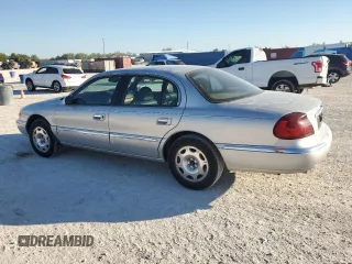 2001 Lincoln Continental with VIN 1LNHM97V01Y667338, listed as a Copart auction lot 82692274 with 126,875 mi miles and Clean Title. Bid and sale history available at carsss.com. Image 2.