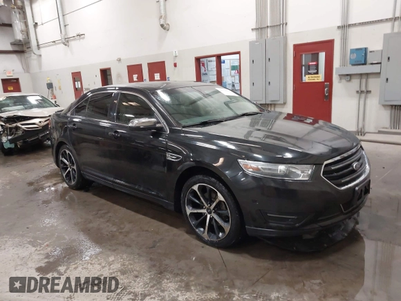 2014 Ford Taurus Limited z VIN 1FAHP2J8XEG112565, wystawiony jako IAAI lot #41554413 z przebiegiem 180 870 mil mil oraz . Historia ofert i sprzedaży dostępna na DreamBid. Obrazek 1.