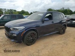 2021 BMW X5 M50i z VIN 5UXJU4C03M9H67176, wystawiony jako Copart lot #53827695 z przebiegiem Nie podano mil oraz Szkoda całkowita • Salvage title. Historia ofert i sprzedaży dostępna na DreamBid. Obrazek 1.