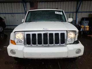 2010 Jeep Commander Limited with VIN 1J4RG5GT0AC137563, listed as a Copart auction lot 54178235 with 146,196 mi miles and Salvage title. Bid and sale history available at DreamBid. Image 5.