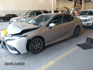 2023 Toyota Camry SE z VIN 4T1G11BK4PU093457, wystawiony jako IAAI lot #42061933 z przebiegiem 21 275 mil mil oraz . Historia ofert i sprzedaży dostępna na DreamBid. Obrazek 18.
