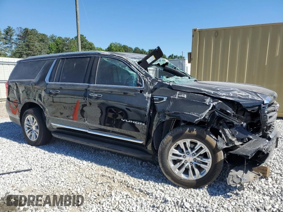 2023 GMC Yukon XL SLT with VIN 1GKS2GKDXPR254627, listed as a Copart auction lot 59226594 with 39,428 mi miles and Salvage Title. Bid and sale history available at DreamBid. Image 4.