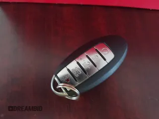 2016 Infiniti Q50 Sport z VIN JN1EV7AP3GM306031, wystawiony jako IAAI lot #42292267 z przebiegiem Nie podano mil oraz . Historia ofert i sprzedaży dostępna na DreamBid. Obrazek 11.