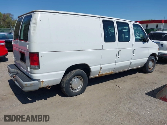 1999 Ford Econoline Cargo with VIN 1FTRE1421XHB21609, listed as a IAAI auction lot 42070347 with 103,104 mi miles. Bid and sale history available at carsss.com. Image 4.