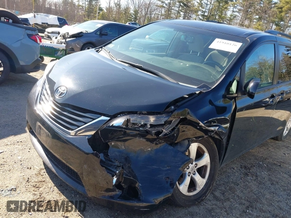 2015 Toyota Sienna LE AAS with VIN 5TDKK3DCXFS594370, listed as a IAAI auction lot 41910126 with 131,638 mi miles. Bid and sale history available at carsss.com. Image 6.