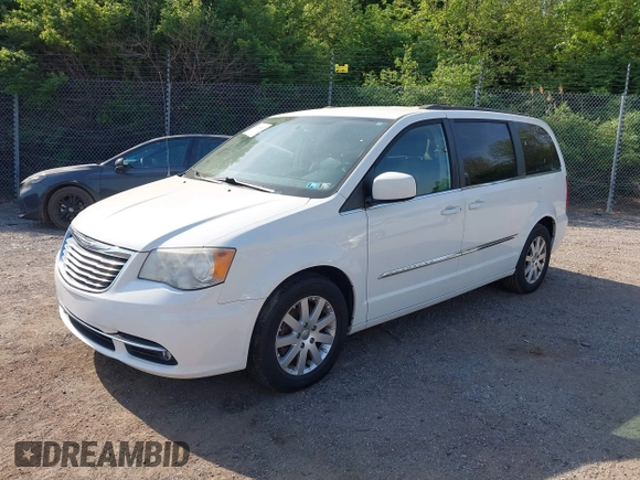 2013 Chrysler Town & Country Touring with VIN 2C4RC1BG9DR744836, listed as a IAAI auction lot 42104087 with 159,482 mi miles. Bid and sale history available at carsss.com. Image 2.