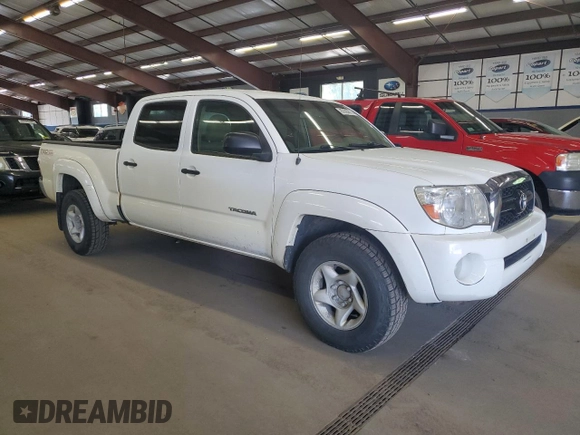 2011 Toyota Tacoma with VIN 3TMMU4FN8BM026877, listed as a Copart auction lot 65326895 with 214,919 mi miles and Clean title. Bid and sale history available at DreamBid. Image 4.