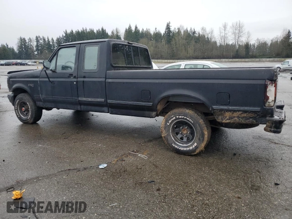 1992 Ford F-150 with VIN 1FTEX14N2NKB29155, listed as a Copart auction lot 84871474 with 104,765 mi miles and Salvage Title. Bid and sale history available at carsss.com. Image 2.