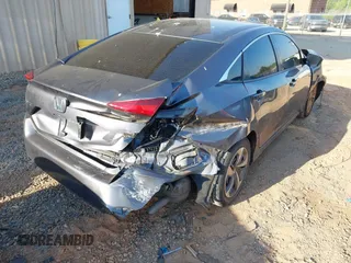 2020 Honda Civic LX with VIN 2HGFC2F67LH534381, listed as a IAAI auction lot 42056676 with 124,344 mi miles and . Bid and sale history available at DreamBid. Image 18.