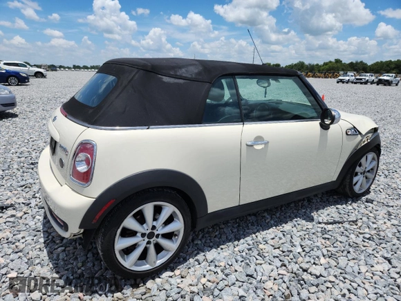 2015 MINI Convertible S с VIN WMWZP3C50F2A91635, выставлен на аукционе Copart как лот 61482285 с пробегом 105 437 миль миль и Списание • Salvage title. История ставок и продаж доступна на DreamBid. Изображение 3.