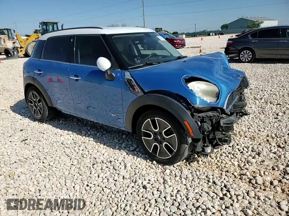 2011 MINI Countryman S with VIN WMWZC5C54BWL53955, listed as a Copart auction lot 52187405 with 124,470 mi miles and Salvage Title. Bid and sale history available at DreamBid. Image 11.
