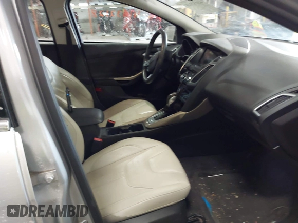 2018 Ford Focus Titanium with VIN 1FADP3N25JL261736, listed as a IAAI auction lot 41032128 with 59,142 mi miles and . Bid and sale history available at DreamBid. Image 5.