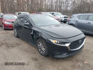 2021 Mazda Mazda3 Sedan 2.5 S with VIN 3MZBPAAL8MM201924, listed as a IAAI auction lot 40977248 with 89,894 mi miles. Bid and sale history available at carsss.com. Image 1.