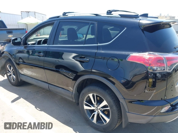 2018 Toyota RAV4 XLE with VIN 2T3WFREV2JW447623, listed as a IAAI auction lot 42410168 with 84,800 mi miles and . Bid and sale history available at DreamBid. Image 14.