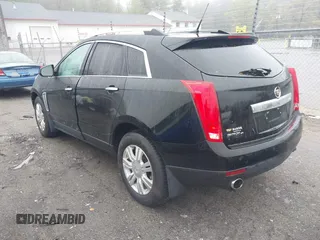 2014 Cadillac SRX Luxury Collection z VIN 3GYFNEE32ES643679, wystawiony jako IAAI lot #42172274 z przebiegiem 122 276 mil mil oraz . Historia ofert i sprzedaży dostępna na DreamBid. Obrazek 3.