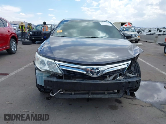 2014 Toyota Camry L with VIN 4T1BF1FK0EU853905, listed as a IAAI auction lot 42217834 with 108,612 mi miles and . Bid and sale history available at DreamBid. Image 6.