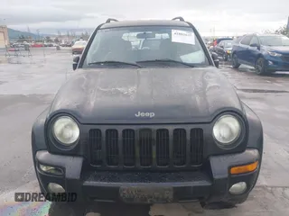 2004 Jeep Liberty Limited with VIN 1J4GL58K94W318379, listed as a IAAI auction lot 41802645 with 275,834 mi miles. Bid and sale history available at carsss.com. Image 6.