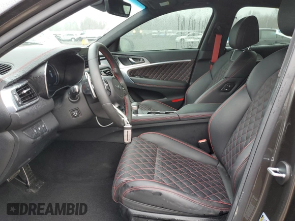 2023 Genesis G70 3.3T with VIN KMTG54TE2PU113421, listed as a Copart auction lot 46648975 with 17,375 mi miles and Salvage title. Bid and sale history available at DreamBid. Image 7.